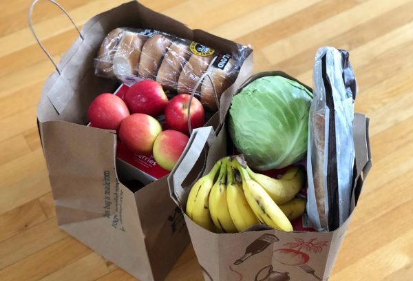 paper bags full of fresh groceries
