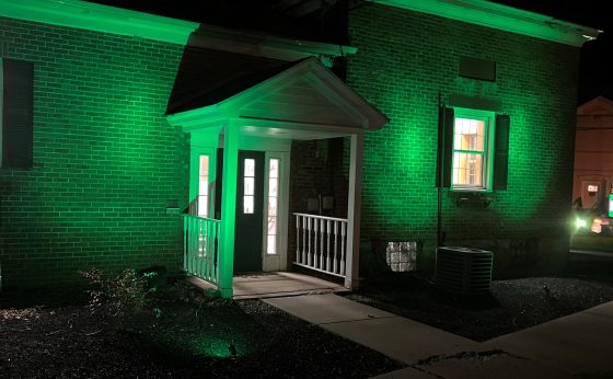 Greenfield Illuminates in Green for Veterans Month